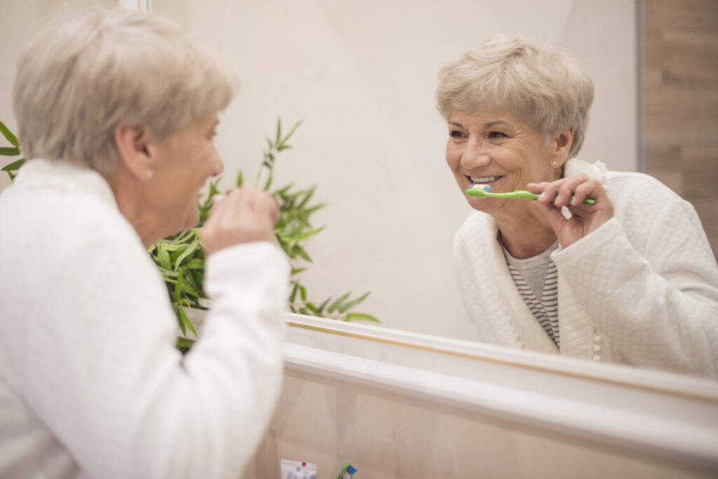 brushing teeth front mirror scaled